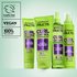 Garnier Fructis curly hair product line: including Curl Shine Conditioning Jelly, Curl Control Scrunching Gel, Curl Shape Defining Spray Gel, and Curl Construct Creation Mousse, featuring vegan formulas and 100% recycled plastic caps.