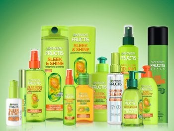 A wide array of Garnier Fructis Sleek & Shine products, including shampoos, conditioners, serums, leave-ins, and styling products.