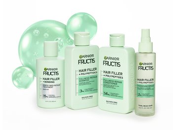 Group shot of Garnier Fructis Hair Filler Fullness Repair System.